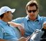 Faldo and wingman Harrington discuss the course.