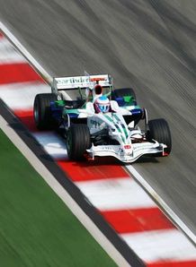 Button - Honda on track