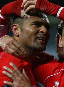 Alves celebrates his goal