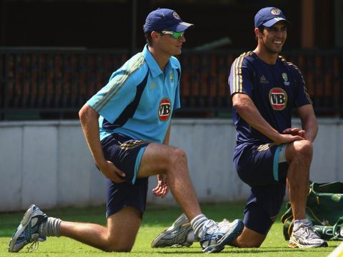 Stuart Clark and Mitchell Johnson have a bit of a stretch...
