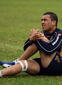 Digby Ioane stretches out before wallaby training
