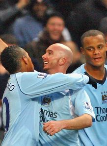 City cruise as Gunners lose