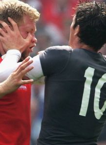 Pat Riordan gets a push in the face