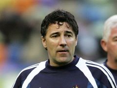 Dean Saunders' Wrexham travel to Torquay