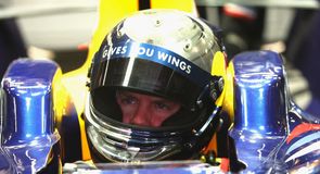 Vettel stays on top