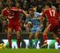 Reds go top despite draw