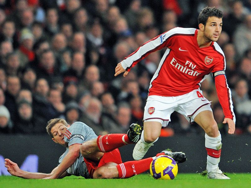Cesc Fabregas was challenged by Steven Gerrard in Arsenal-Liverpool match on Sunday