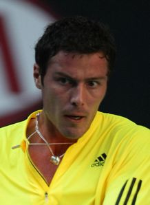 Safin bows out early again