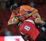 David de Villiers of the Cheetahs is tackled by Willem Alberts of the Lions
