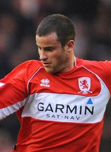 Bates happy to stay