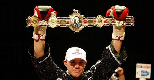 Moore: goes in against Ryan Rhodes in a fantastic Bolton battle