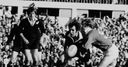 Black tie-up: Doug Morgan gets hold of Lyn Davies during the third Test