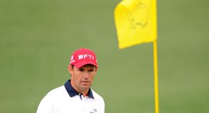 A stern Padraig Harrington had big early problems with a quadruple-bogey nine at the second.