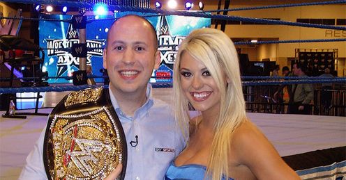 Belter: Adam Craig with a WWE treasure on each arm
