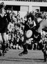 Black tie-up: Doug Morgan gets hold of Lyn Davies during the third Test