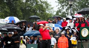 Rickie Fowler hits the championship's opening tee shot.