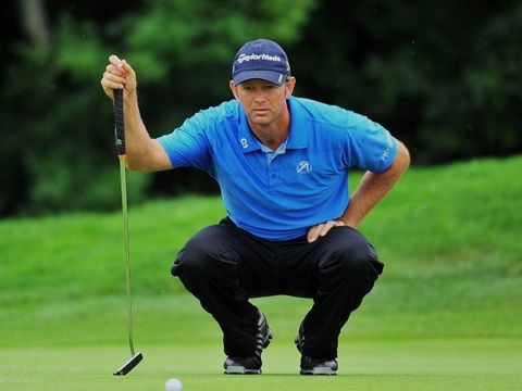 First round leader Retief Goosen with his new putter
