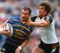 Rhinos hold off brave Bulls