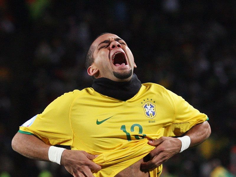 Dani Alves, Brazil. He doesnt look very happy... perhaps hes feeling the cold.