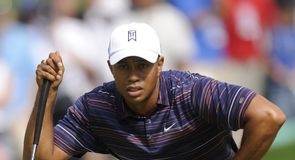 Tiger assumes halfway lead