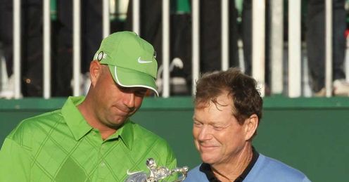 Cink and Watson admire the trophy at Turnberry