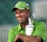 The champion Stewart Cink lifts the Claret Jug.