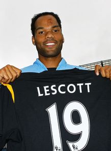 Lescott sets top four target