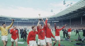 Jubilant England players parade the trophy around Wembley
