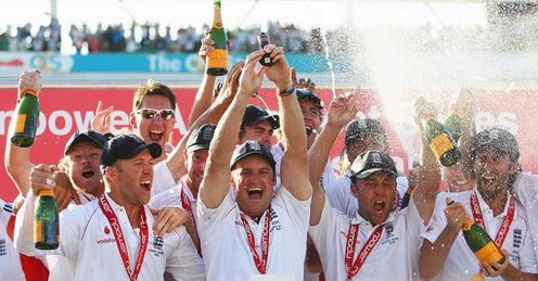Whites awash: champagne covers the England players as they celebrate at the Oval