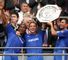 Terry and Lampard lift the Community Shield for Chelsea as Didier Drogba salutes the crowd.