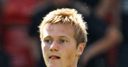 Cooper signs new deal
