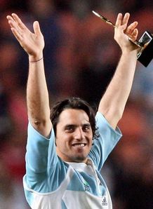Gus Pichot arms raised Gus Pichot arms raised