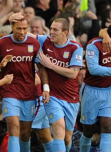 Carew thwarts Everton hopes