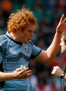 Paul Tito explains to a ref