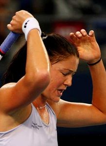 Safina out, Serena on top