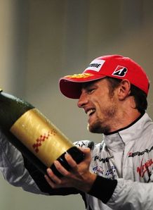 Brawn bid to keep Button