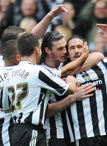 Magpies fly on