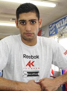 Khan cools Manny talk