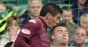 10-man Dons hold Well