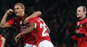 Antonio Valencia is mobbed for his part in the goal that gave Manchester United a 3-3 draw with CSKA Moscow.
