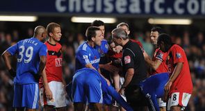 Ashley Cole after being challenged by Darren Fletcher