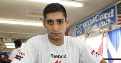 Khan cools Manny talk
