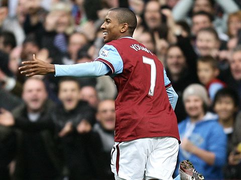 Ashley Young celebrates after giving Aston Villa an early lead against Bolton.