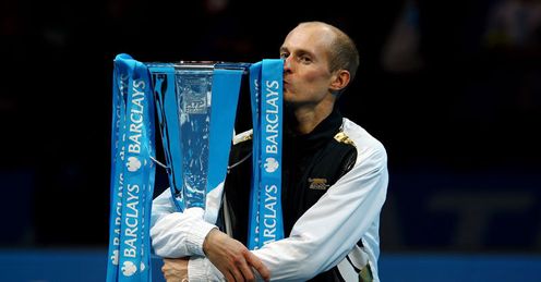 Loving it: Davydenko celebrates after finishing the season in style