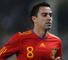 Xavi hails club-like Spain