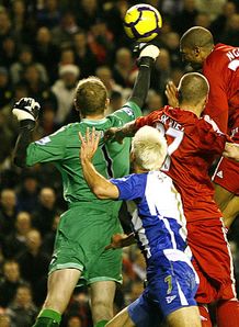 Reds scrape nervy win