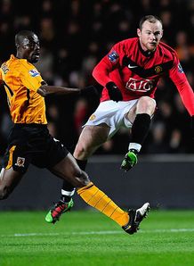 Rooney atones for United