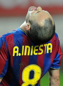 Iniesta out for a month