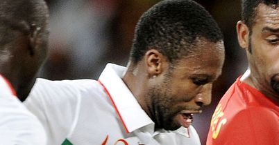 Mali crash out despite win