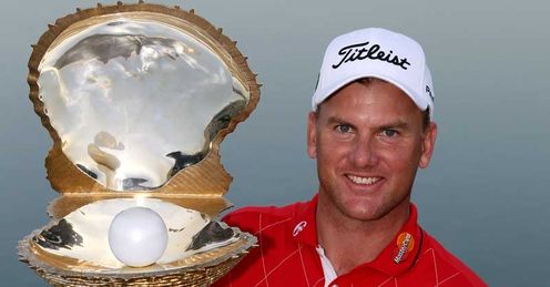 Robert Karlsson with the glittering trophy he won in Doha on Sunday